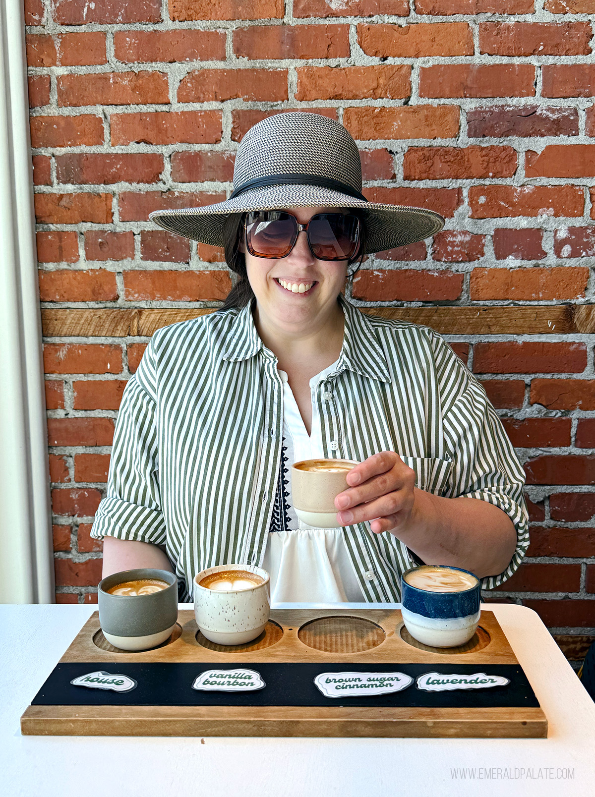 woman enjoying a coffee flight, one of the best activities in Snohomish