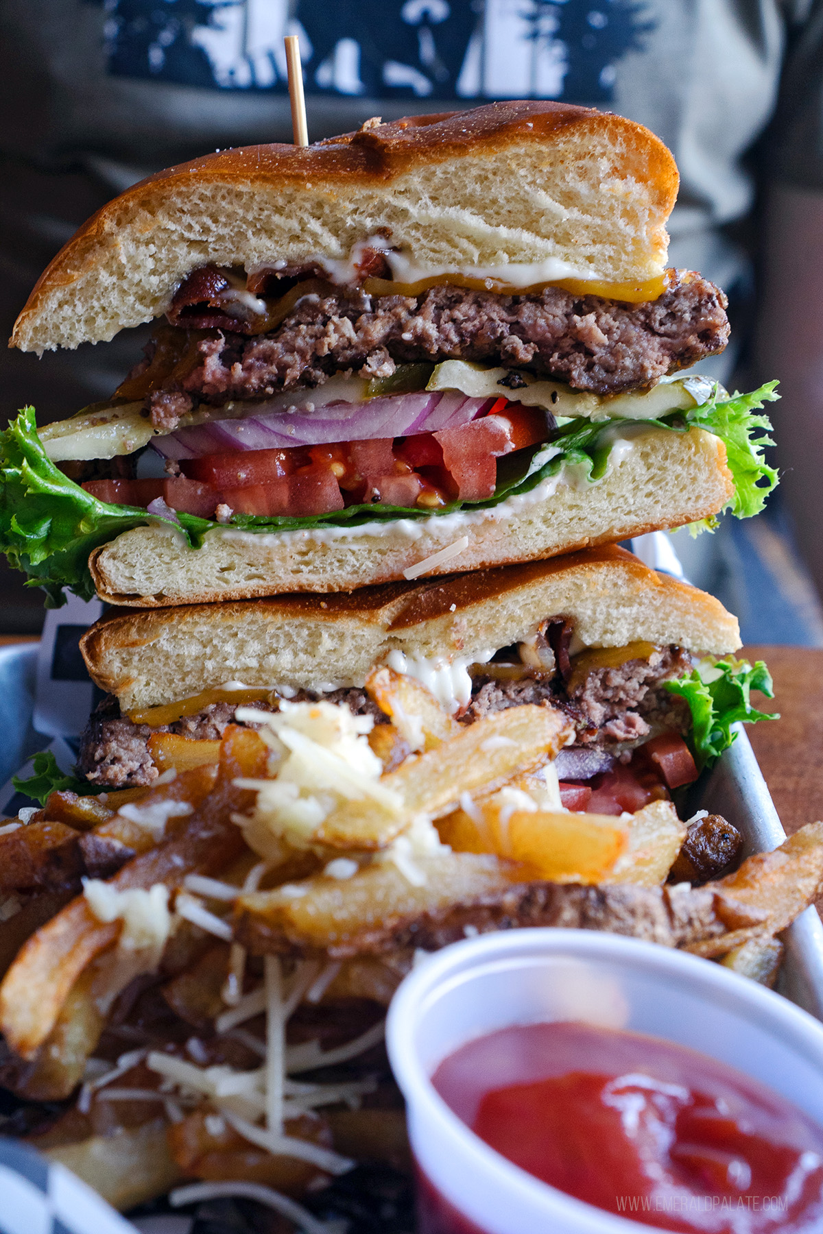 two halves of a burger stacked on top of each other