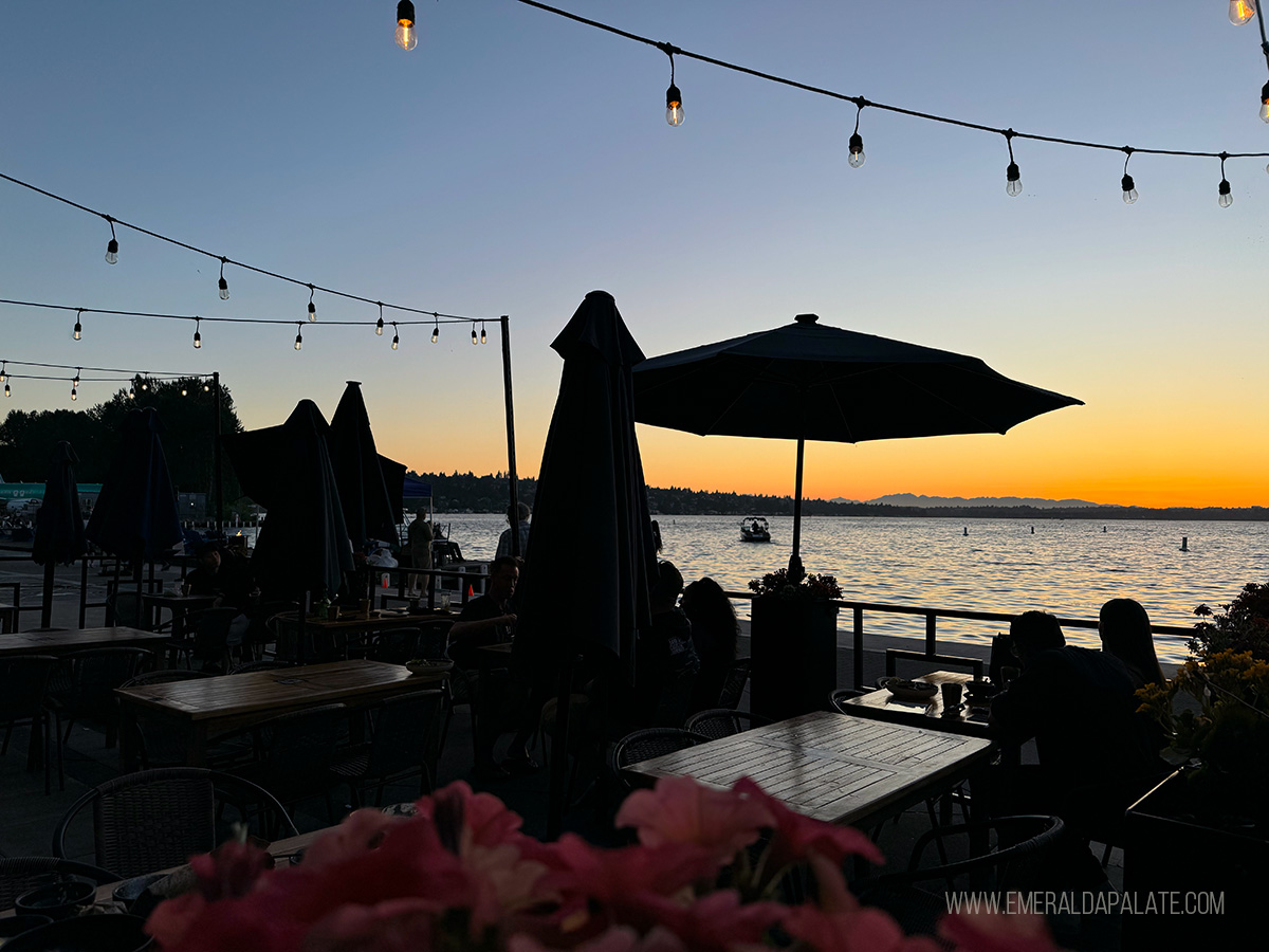 outdoor dining patio in Seattle at sunset with string lights