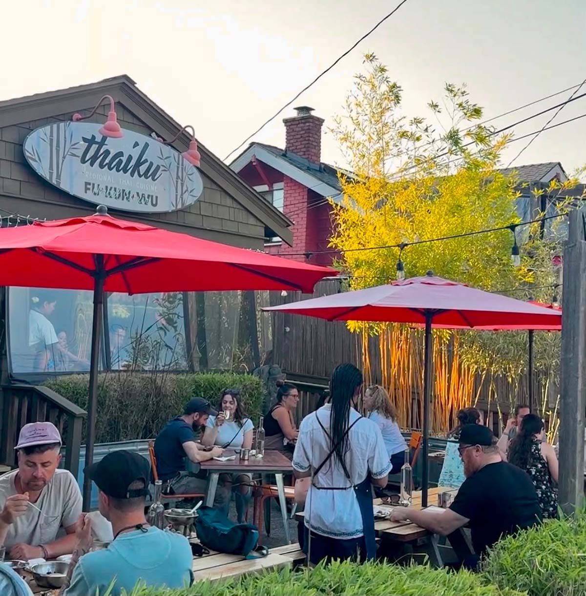 People enjoying dinner on an outdoor patio in Seattle