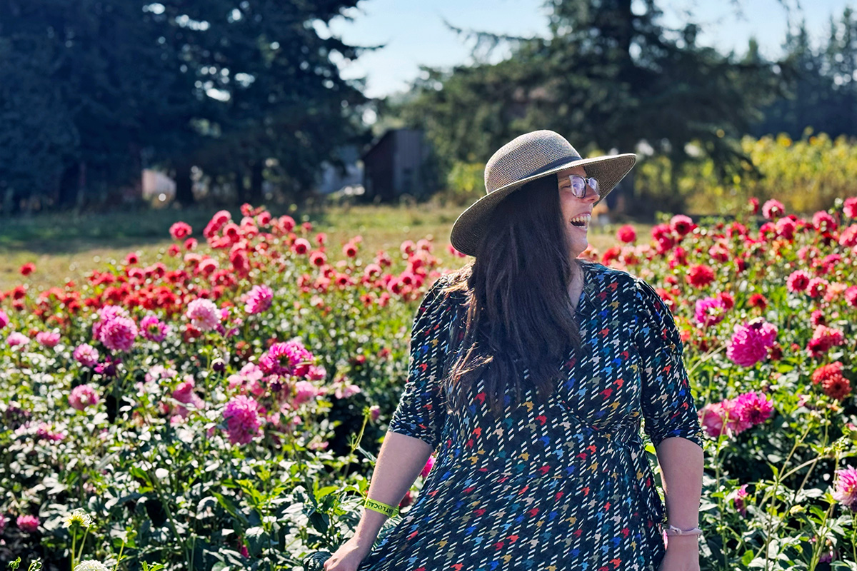 woman frolicking in a flower field, one of the best things to do in Blaine, WA